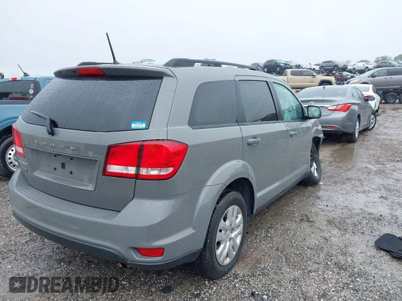 2019 Dodge Journey SE with VIN 3C4PDCBB2KT804440, listed as a IAAI auction lot 41333876 with 72,209 mi miles and . Bid and sale history available at DreamBid. Image 4.