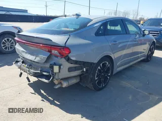 2024 Kia K5 GT-Line z VIN 5XXG64J22RG235225, wystawiony jako IAAI lot #41757058 z przebiegiem 13 071 mil mil oraz . Historia ofert i sprzedaży dostępna na DreamBid. Obrazek 4.