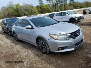 2017 Nissan Altima SV with VIN 1N4AL3AP9HC159284, listed as a Copart auction lot 50155335 with 121,360 mi miles and Salvage title. Bid and sale history available at DreamBid. Image 4.