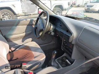 1995 Ford Escort with VIN 3FASP15J9SR190126, listed as a IAAI auction lot 39936278 with 248,088 mi miles and . Bid and sale history available at DreamBid. Image 5.