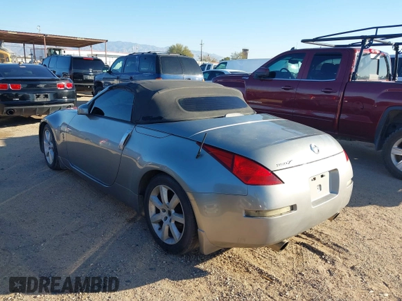 2005 Nissan 350Z Touring z VIN JN1AZ36A25M754869, wystawiony jako IAAI lot #41429477 z przebiegiem 110 896 mil mil oraz . Historia ofert i sprzedaży dostępna na DreamBid. Obrazek 3.