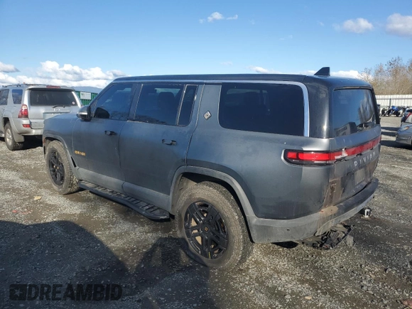 2022 Rivian R1S Launch Edition with VIN 7PDSGABL1NN000514, listed as a Copart auction lot 77444184 with 29,490 mi miles and Salvage Title. Bid and sale history available at DreamBid. Image 2.