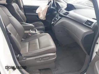 2012 Honda Odyssey EX-L with VIN 5FNRL5H62CB059481, listed as a IAAI auction lot 42241415 with 135,244 mi miles and . Bid and sale history available at DreamBid. Image 5.