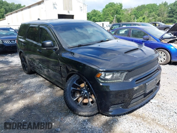 2020 Dodge Durango R/T with VIN 1C4SDJCT0LC212814, listed as a IAAI auction lot 42578232 with 90,325 mi miles and . Bid and sale history available at DreamBid. Image 6.