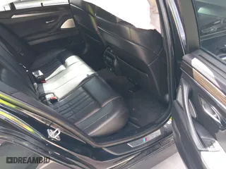 2013 BMW M5 with VIN WBSFV9C54DD095547, listed as a IAAI auction lot 41601733 with 1 mi miles. Bid and sale history available at carsss.com. Image 8.