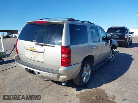 2013 Chevrolet Tahoe LT z VIN 1GNSCBE05DR378859, wystawiony jako IAAI lot #41074700 z przebiegiem 184 925 mil mil oraz . Historia ofert i sprzedaży dostępna na DreamBid. Obrazek 4.