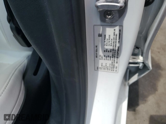 2023 Tesla Model 3 z VIN 5YJ3E1EA5PF580945, wystawiony jako Copart lot #58139125 z przebiegiem 19 057 mil mil oraz Szkoda całkowita • Salvage title. Historia ofert i sprzedaży dostępna na DreamBid. Obrazek 13.