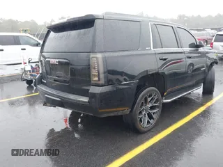 2016 GMC Yukon SLT with VIN 1GKS1BKC8GR217962, listed as a IAAI auction lot 40422726 with 182,293 mi miles. Bid and sale history available at carsss.com. Image 4.