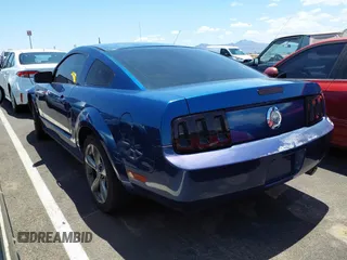 2007 Ford Mustang Deluxe z VIN 1ZVFT80N975241366, wystawiony jako IAAI lot #42408850 z przebiegiem 193 336 mil mil oraz . Historia ofert i sprzedaży dostępna na DreamBid. Obrazek 3.