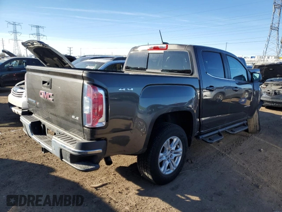 2019 GMC Canyon 4WD SLE with VIN 1GTG6CEN0K1266330, listed as a Copart auction lot 87117014 with 42,096 mi miles and Salvage Title. Bid and sale history available at carsss.com. Image 3.