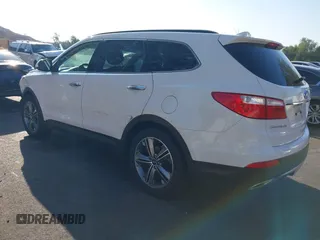 2016 Hyundai Santa Fe SE with VIN KM8SR4HF1GU141799, listed as a IAAI auction lot 41348405 with 99,884 mi miles. Bid and sale history available at carsss.com. Image 3.