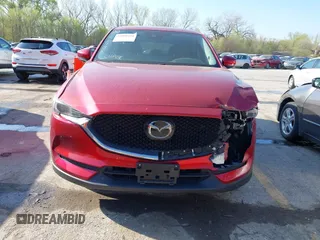 2021 Mazda CX-5 Grand Touring with VIN JM3KFBDM8M1390188, listed as a IAAI auction lot 42000444 with 84,908 mi miles. Bid and sale history available at carsss.com. Image 11.