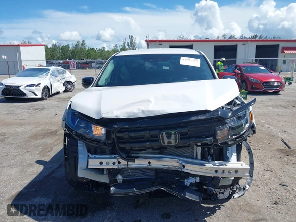2024 Honda Ridgeline Sport with VIN 5FPYK3F14RB011166, listed as a IAAI auction lot 42591313 with 5,175 mi miles and . Bid and sale history available at DreamBid. Image 6.