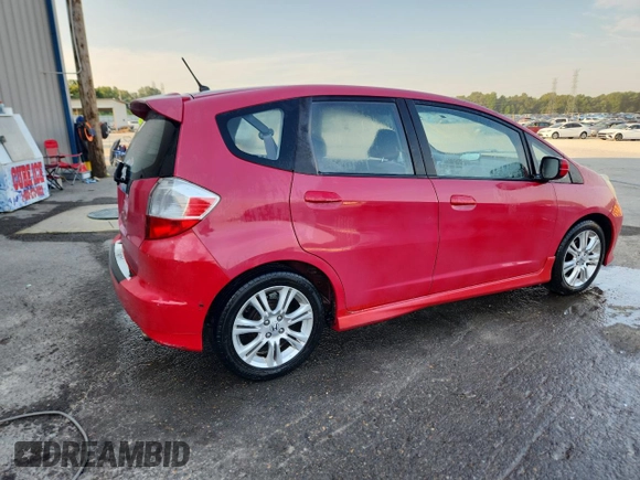 2009 Honda Fit Sport z VIN JHMGE88479S055924, wystawiony jako Copart lot #67186495 z przebiegiem 65 984 mil mil oraz Szkoda całkowita • Salvage title. Historia ofert i sprzedaży dostępna na DreamBid. Obrazek 3.
