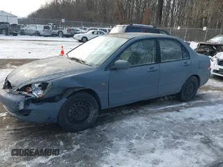2006 Mitsubishi Lancer ES with VIN JA3AJ26E06U005019, listed as a IAAI auction lot 41381773 with 174,034 mi miles. Bid and sale history available at carsss.com. Image 14.