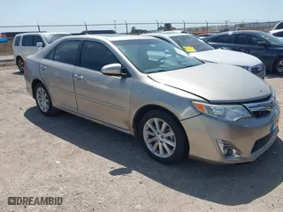 2013 Toyota Camry Hybrid LE with VIN 4T1BD1FK3DU092856, listed as a IAAI auction lot 42010493 with 27,497 mi miles. Bid and sale history available at carsss.com. Image 1.
