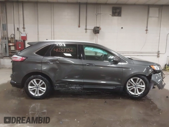 2019 Ford Edge SEL z VIN 2FMPK3J92KBC32443, wystawiony jako IAAI lot #41221732 z przebiegiem 32 307 mil mil oraz . Historia ofert i sprzedaży dostępna na DreamBid. Obrazek 14.