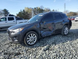2014 Mazda CX-5 Grand Touring with VIN JM3KE2DY4E0323603, listed as a Copart auction lot 49884835 with 0 mi miles and Salvage Title. Bid and sale history available at carsss.com. Image 1.