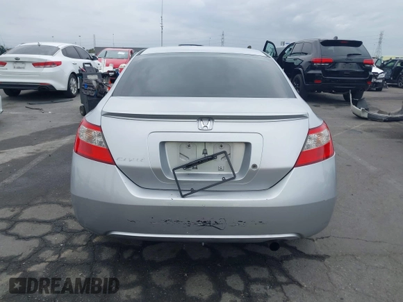 2009 Honda Civic Cpe LX with VIN 2HGFG12669H524342, listed as a IAAI auction lot 42061391 with 162,369 mi miles. Bid and sale history available at carsss.com. Image 16.