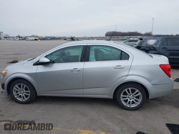 2012 Chevrolet Sonic LT with VIN 1G1JC5SH0C4162034, listed as a IAAI auction lot 41967195 with 87,086 mi miles and . Bid and sale history available at DreamBid. Image 14.
