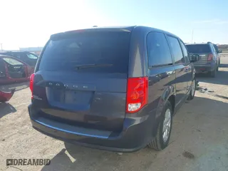 2018 Dodge Grand Caravan SE with VIN 2C4RDGBG3JR348560, listed as a IAAI auction lot 41657312 with 135,007 mi miles. Bid and sale history available at carsss.com. Image 4.