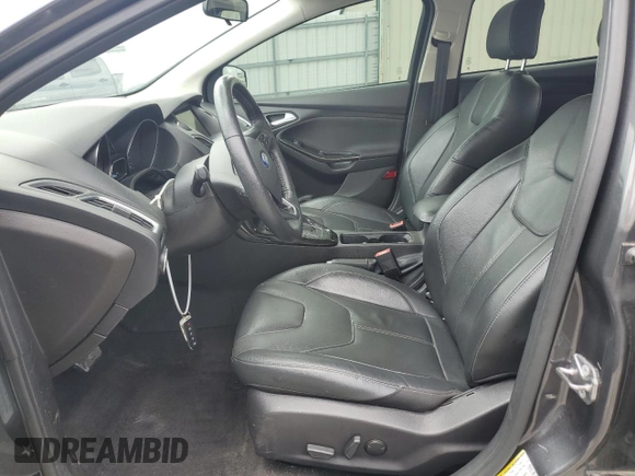 2017 Ford Focus Titanium z VIN 1FADP3N22HL307260, wystawiony jako Copart lot #61399785 z przebiegiem 103 293 mil mil oraz Szkoda całkowita • Salvage title. Historia ofert i sprzedaży dostępna na DreamBid. Obrazek 7.