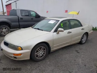 2000 Mitsubishi Diamante LS with VIN 6MMAP67P7YT005234, listed as a IAAI auction lot 41896098 with 131,852 mi miles. Bid and sale history available at carsss.com. Image 2.