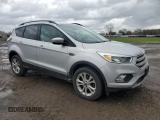 2018 Ford Escape SE with VIN 1FMCU9GD0JUA25579, listed as a Copart auction lot 51629605 with 121,678 mi miles and Clean Title. Bid and sale history available at carsss.com. Image 4.