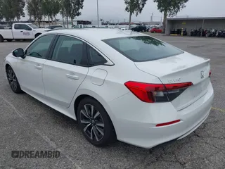 2024 Honda Civic EX z VIN 2HGFE1F77RH337748, wystawiony jako IAAI lot #42047010 z przebiegiem 5 598 mil mil oraz . Historia ofert i sprzedaży dostępna na DreamBid. Obrazek 3.