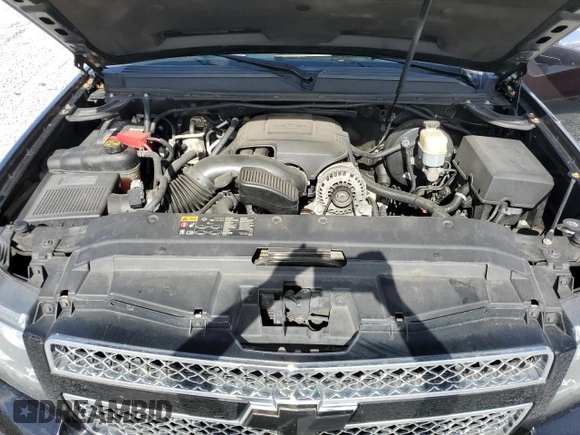 2013 Chevrolet Suburban LTZ with VIN 1GNSCKE0XDR364889, listed as a Copart auction lot 77598334 with 161,656 mi miles and Salvage Title. Bid and sale history available at carsss.com. Image 12.