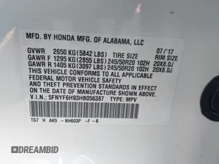 2017 Honda Pilot Touring with VIN 5FNYF6H93HB056387, listed as a IAAI auction lot 41095336 with 90,376 mi miles and . Bid and sale history available at DreamBid. Image 9.