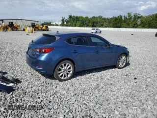 2017 Mazda 3 Touring z VIN JM1BN1L7XH1102372, wystawiony jako Copart lot #61180195 z przebiegiem 57 606 mil mil oraz Szkoda całkowita • Salvage title. Historia ofert i sprzedaży dostępna na DreamBid. Obrazek 3.