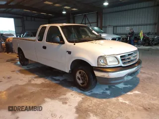 2002 Ford F-150 XL with VIN 1FTRX17L52NA38404, listed as a IAAI auction lot 41871731 with 366,564 mi miles. Bid and sale history available at carsss.com. Image 1.