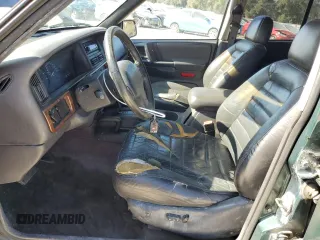 1996 Jeep Grand Cherokee Laredo with VIN 1J4GZ58S1TC340018, listed as a Copart auction lot 86571454 with 0 mi miles and Salvage Title. Bid and sale history available at carsss.com. Image 7.