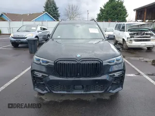 2019 BMW X7 xDrive50i z VIN 5UXCX4C58KLS35818, wystawiony jako IAAI lot #41750098 z przebiegiem 69 661 mil mil oraz . Historia ofert i sprzedaży dostępna na DreamBid. Obrazek 13.