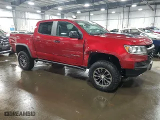 2021 Chevrolet Colorado 4WD ZR2 with VIN 1GCGTEEN7M1111894, listed as a Copart auction lot 85169404 with 56,965 mi miles and Salvage Title. Bid and sale history available at carsss.com. Image 4.