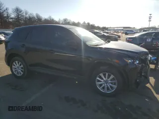 2014 Mazda CX-5 Sport with VIN JM3KE4BE1E0371547, listed as a Copart auction lot 85412744 with 119,597 mi miles and Salvage Title. Bid and sale history available at carsss.com. Image 4.