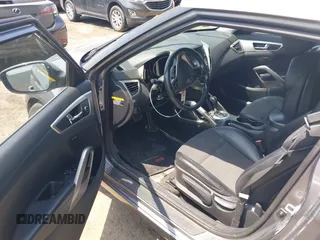 2013 Hyundai Veloster w/Gray Int with VIN KMHTC6AD5DU132237, listed as a IAAI auction lot 42268005 with 84,646 mi miles and . Bid and sale history available at DreamBid. Image 5.