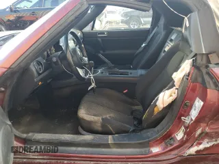 2007 Mazda MX-5 Miata Sport z VIN JM1NC25F970124896, wystawiony jako Copart lot #83624394 z przebiegiem 62 735 mil mil oraz Szkoda całkowita • Salvage title. Historia ofert i sprzedaży dostępna na DreamBid. Obrazek 7.