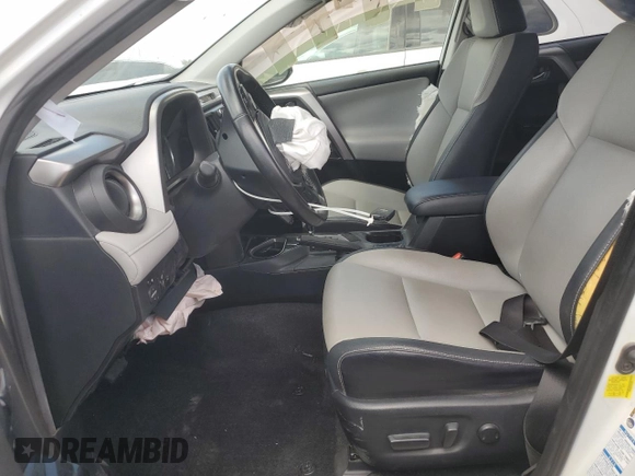 2017 Toyota RAV4 Hybrid Limited with VIN JTMDJREV5HD124597, listed as a Copart auction lot 52014275 with 32,136 mi miles and Salvage Title. Bid and sale history available at carsss.com. Image 7.
