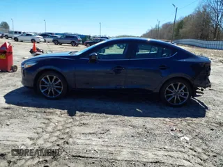 2018 Mazda 3 Touring with VIN 3MZBN1V36JM256934, listed as a IAAI auction lot 41828741 with 58,849 mi miles. Bid and sale history available at carsss.com. Image 15.