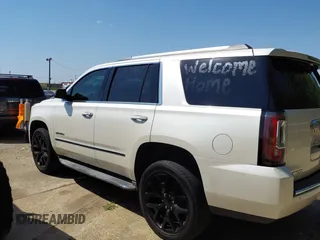 2015 GMC Yukon Denali with VIN 1GKS1CKJ8FR575730, listed as a IAAI auction lot 42048050 with 113,077 mi miles. Bid and sale history available at carsss.com. Image 15.