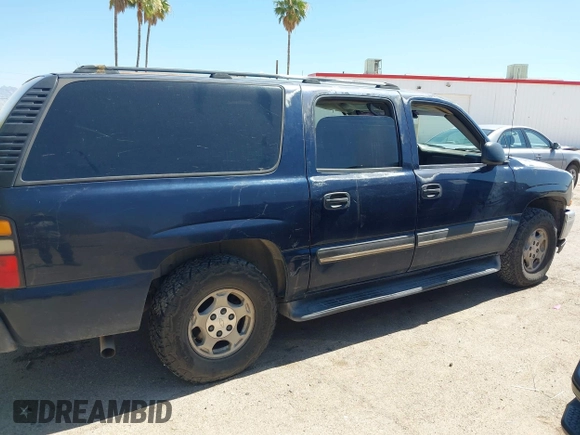 2005 Chevrolet Suburban LS z VIN 1GNEC16Z15J211046, wystawiony jako IAAI lot #42453120 z przebiegiem Nie podano mil oraz . Historia ofert i sprzedaży dostępna na DreamBid. Obrazek 13.