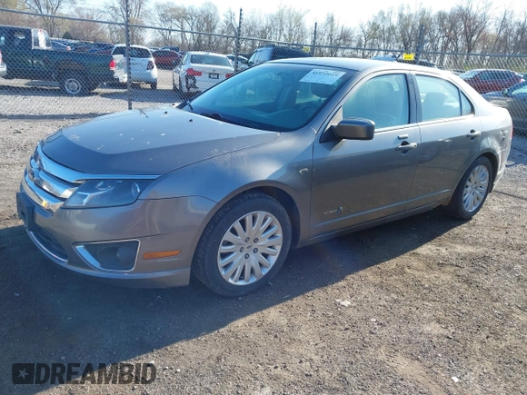 2010 Ford Fusion Hybrid z VIN 3FADP0L35AR423330, wystawiony jako IAAI lot #41972619 z przebiegiem 154 026 mil mil oraz . Historia ofert i sprzedaży dostępna na DreamBid. Obrazek 17.