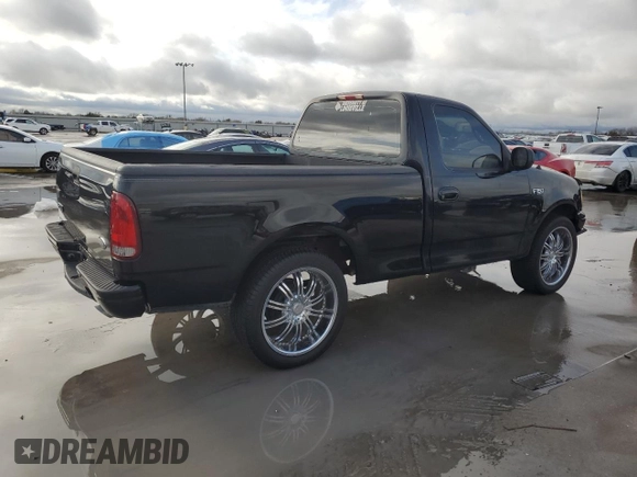 2000 Ford F-150 XL with VIN 1FTZF1725YNB93067, listed as a Copart auction lot 86750464 with Not provided miles and Salvage title. Bid and sale history available at DreamBid. Image 3.