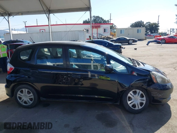 2010 Honda Fit with VIN JHMGE8H28AS012129, listed as a IAAI auction lot 41980485 with 144,170 mi miles. Bid and sale history available at carsss.com. Image 13.