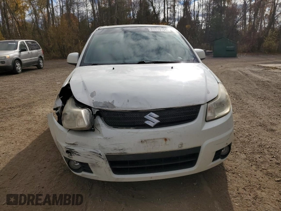2009 Suzuki SX4 with VIN JS2YA411895100156, listed as a Copart auction lot 77779704 with 235,846 mi miles and Salvage Title. Bid and sale history available at carsss.com. Image 4.
