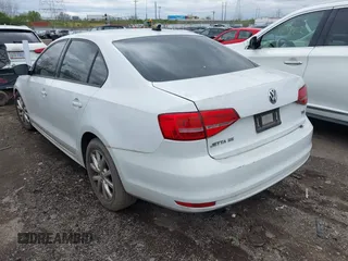 2015 Volkswagen Jetta Sedan 1.8T SE with VIN 3VWD17AJXFM324736, listed as a IAAI auction lot 42038277 with 151,817 mi miles. Bid and sale history available at carsss.com. Image 3.