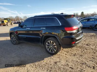2018 Jeep Grand Cherokee Limited with VIN 1C4RJFBT9JC200504, listed as a Copart auction lot 80481684 with 104,398 mi miles and Salvage title. Bid and sale history available at DreamBid. Image 2.