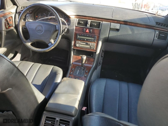 1996 Mercedes-Benz E Class with VIN WDBJF20F9TJ023003, listed as a Copart auction lot 86356784 with 230,944 mi miles and Salvage Title. Bid and sale history available at carsss.com. Image 8.